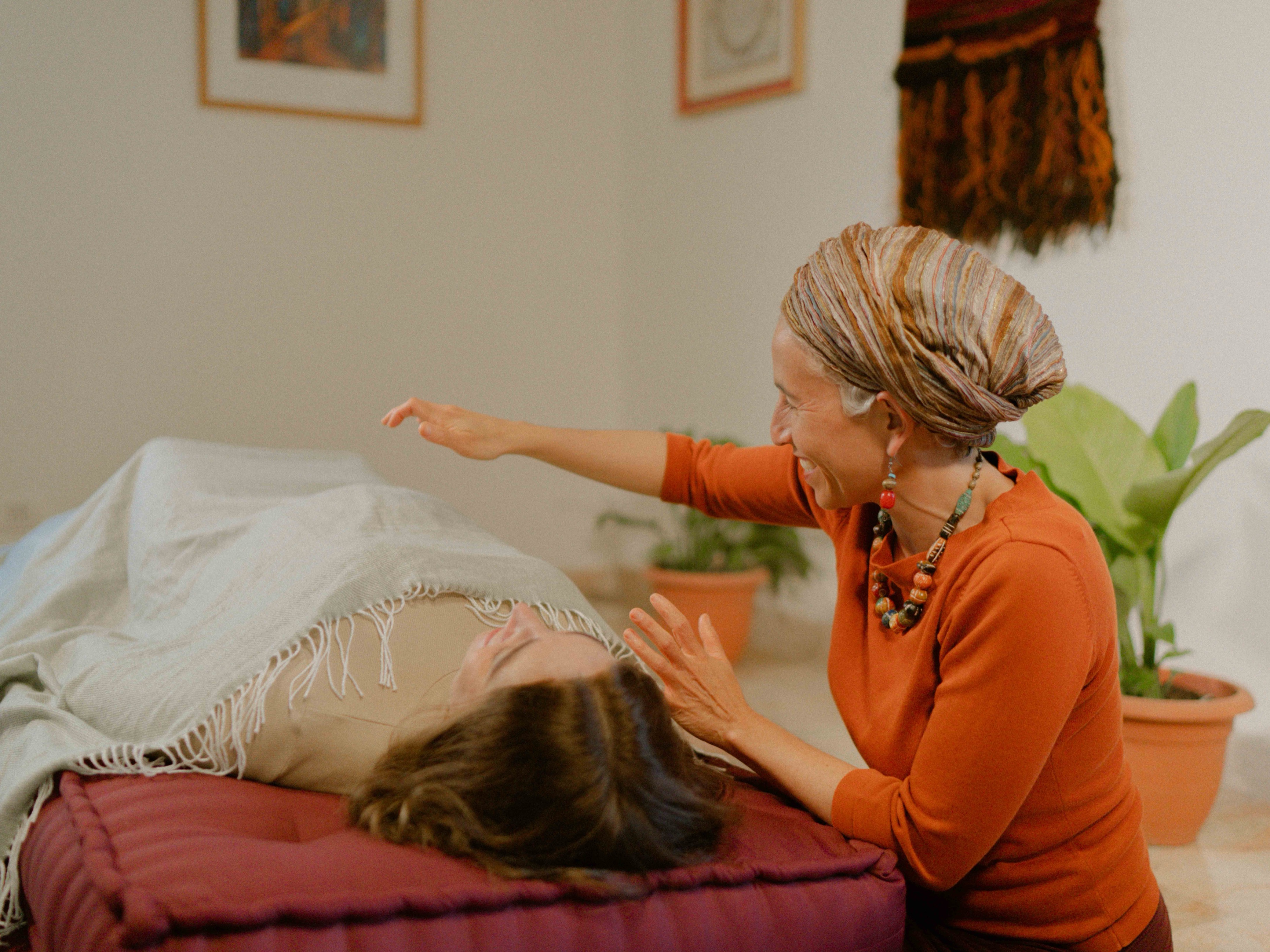 Chana guiding a client through a session